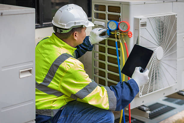Professional Air Duct Cleaning technician working in Argyle, TX